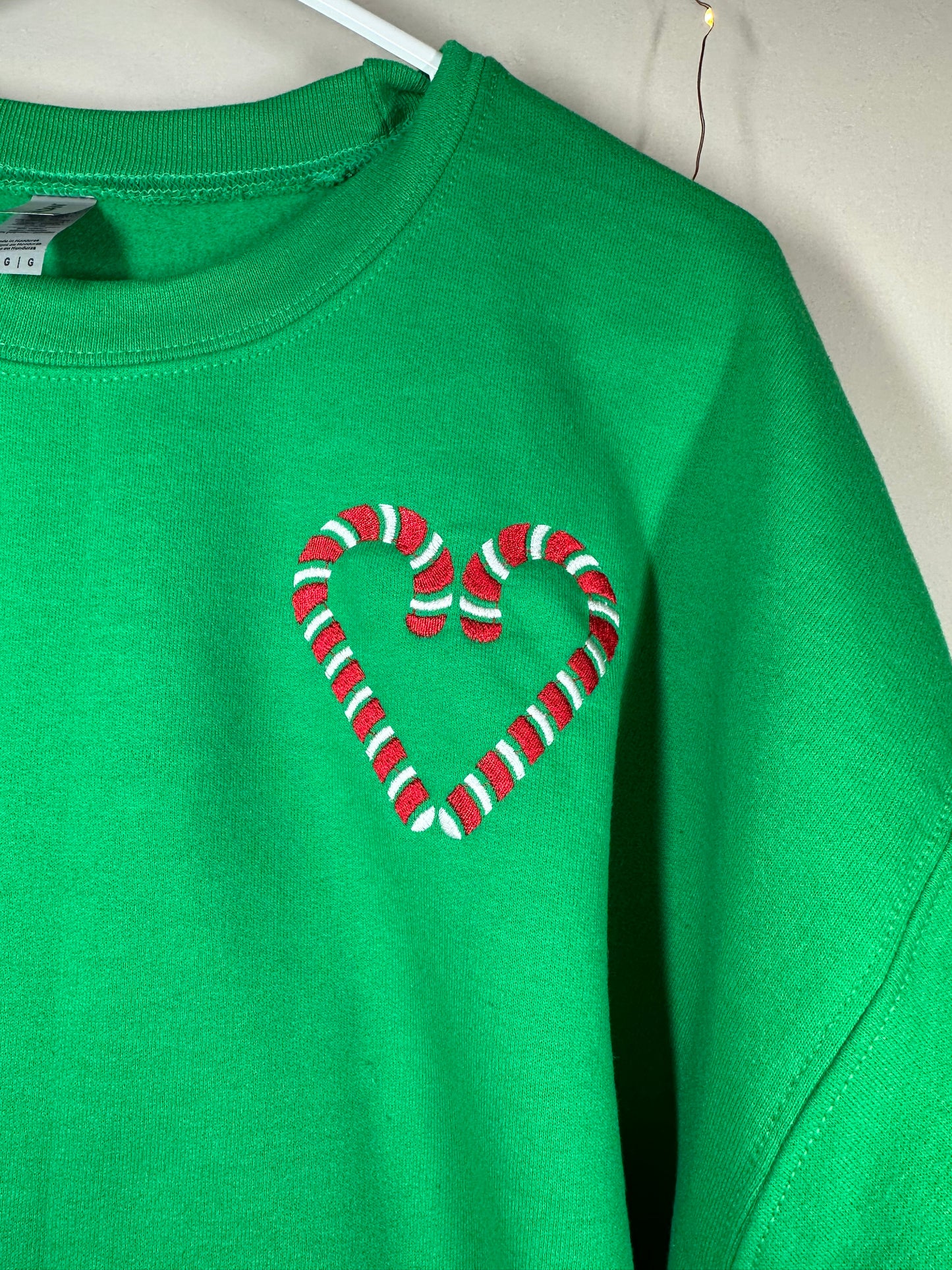 There's Room For Everyone On The Nice List Candy Cane Embroidered Sweatshirt | Christmas Crewneck with Front and Back Design